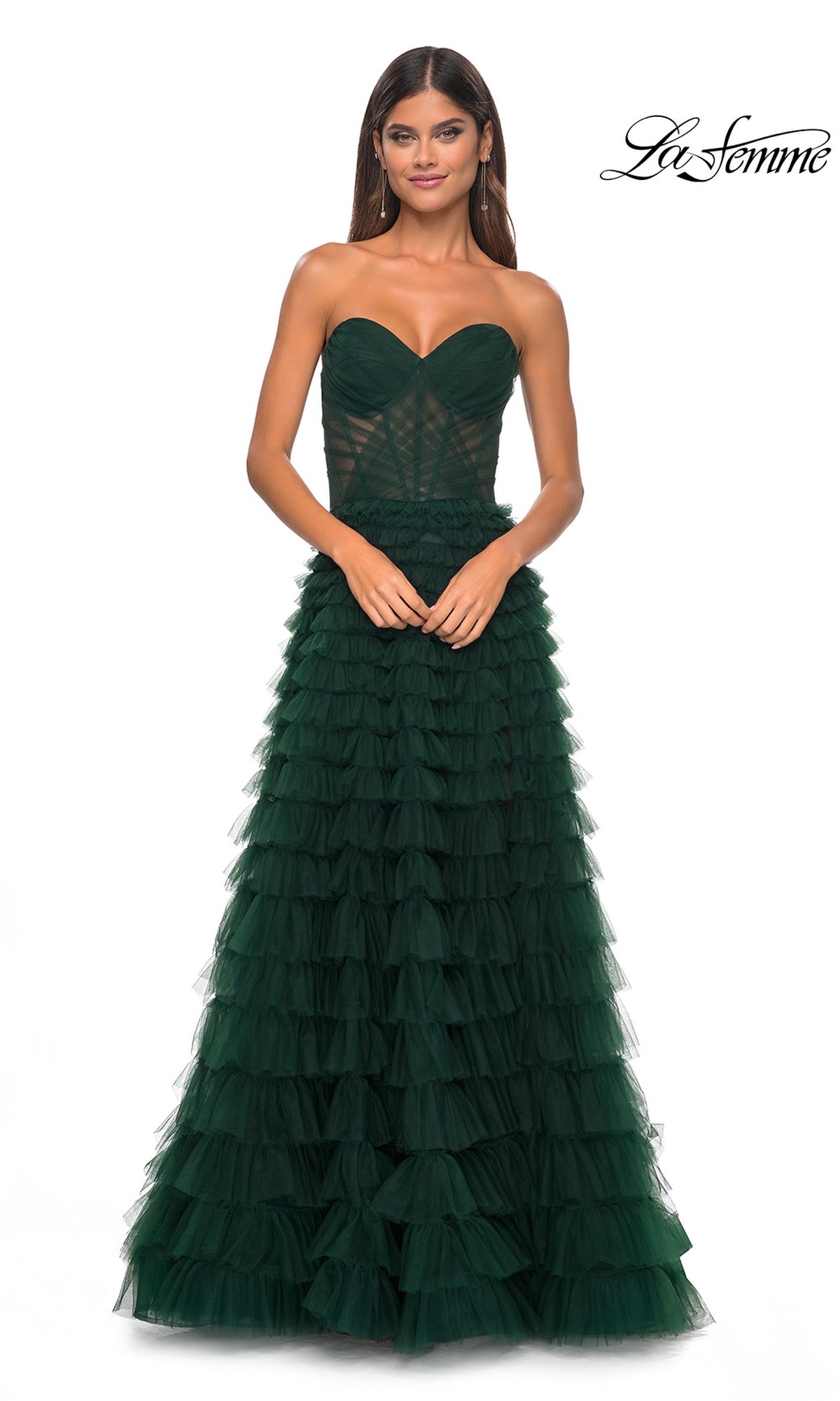 Model showcases the La Femme Strapless Long Ruffled Prom Dress 32283 in dark green, featuring a fitted bodice and ruffled tulle skirt, posed against a white background.
